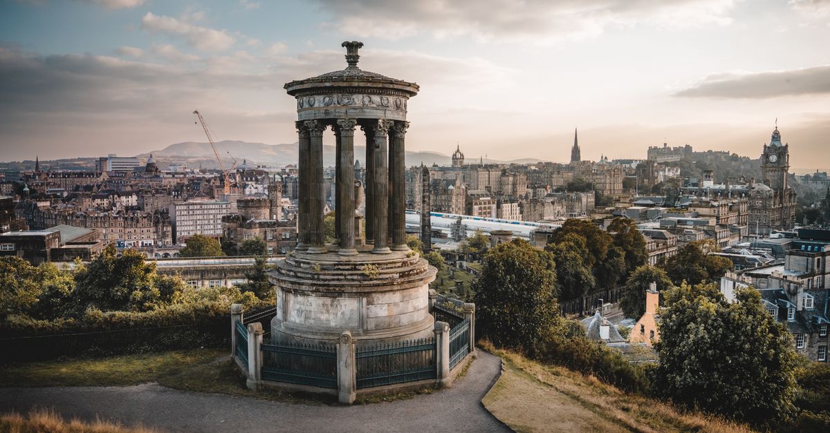 Captivating view from Calton Hill in Edinburgh showcasing historic architecture at sunset.