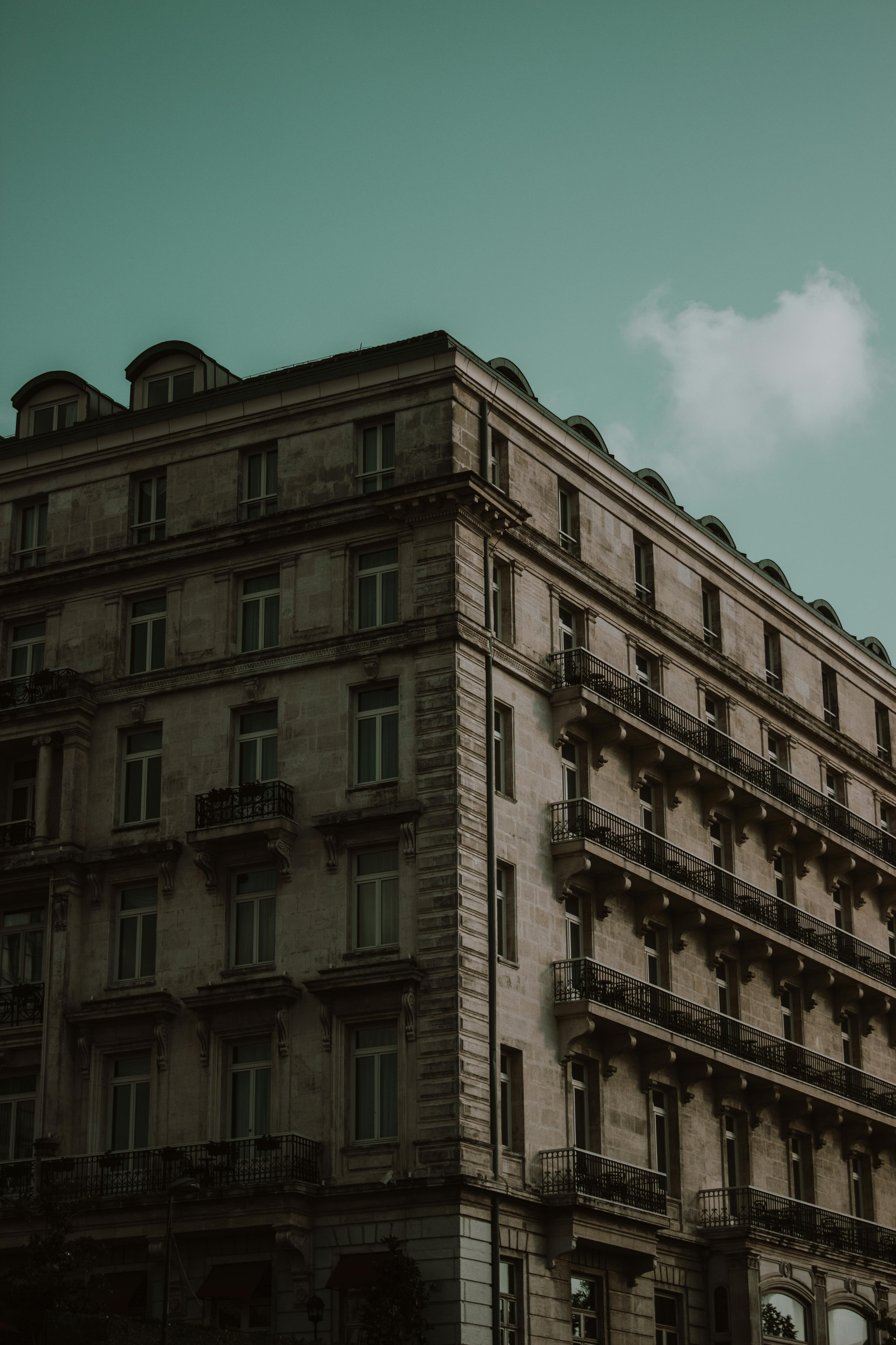 Photography of Gray Concrete Multi-story Building \u00b7 Free Stock Photo