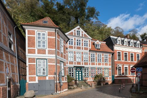 Free Charming view of historic half-timbered buildings in Lauenburg's old town on a sunny day. Stock Photo