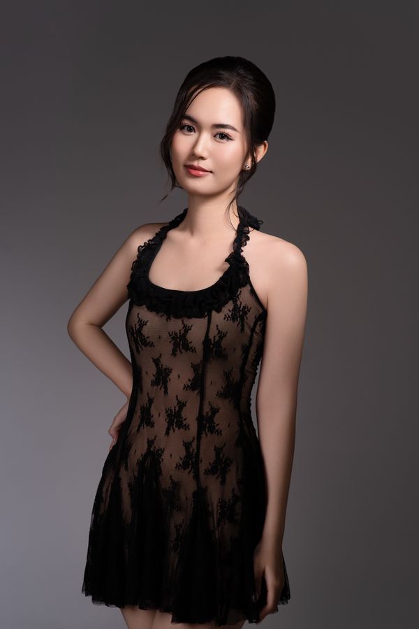 Woman in a little black lace dress