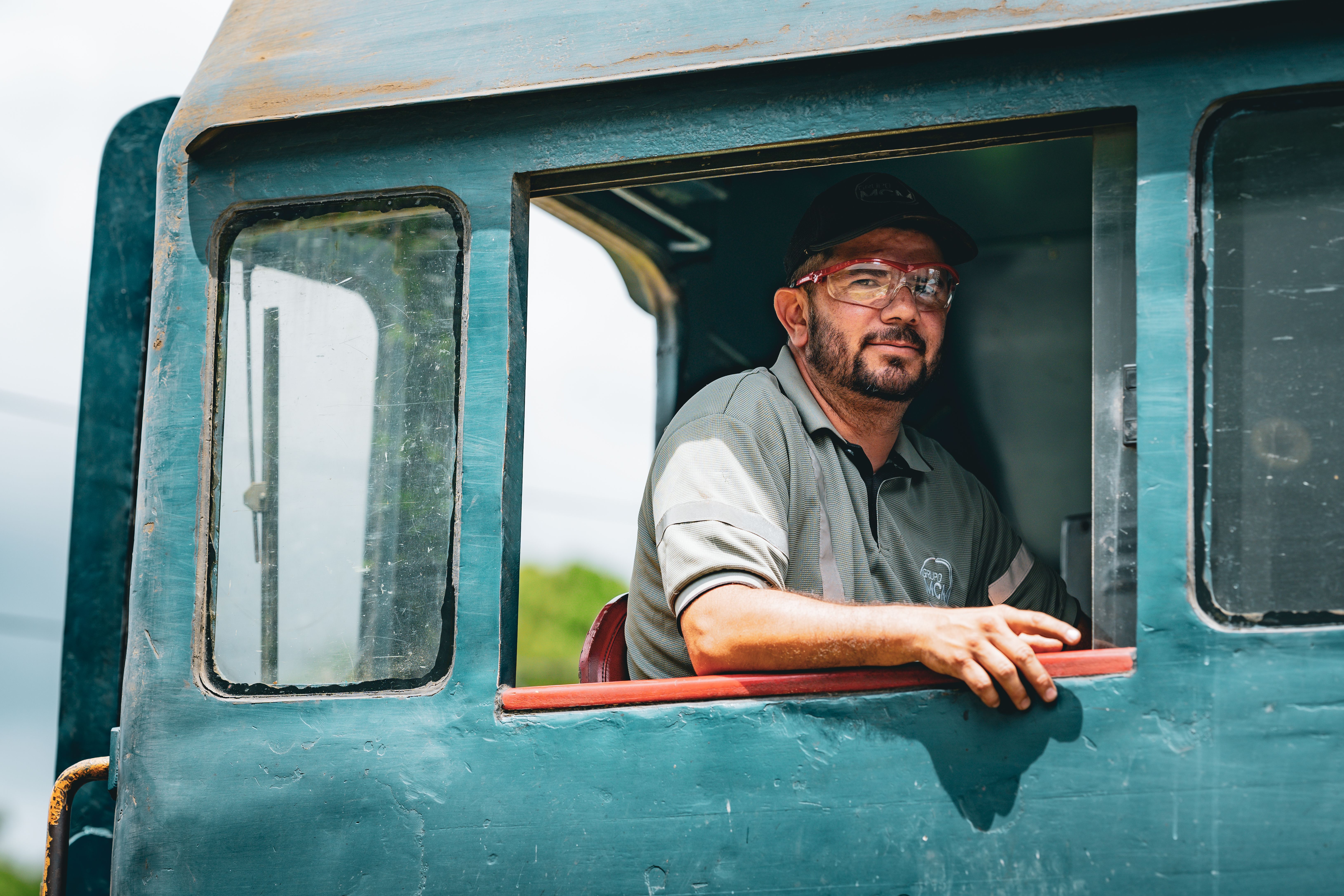 Portrait of a train engineer in the cab, San José, Costa Rica.