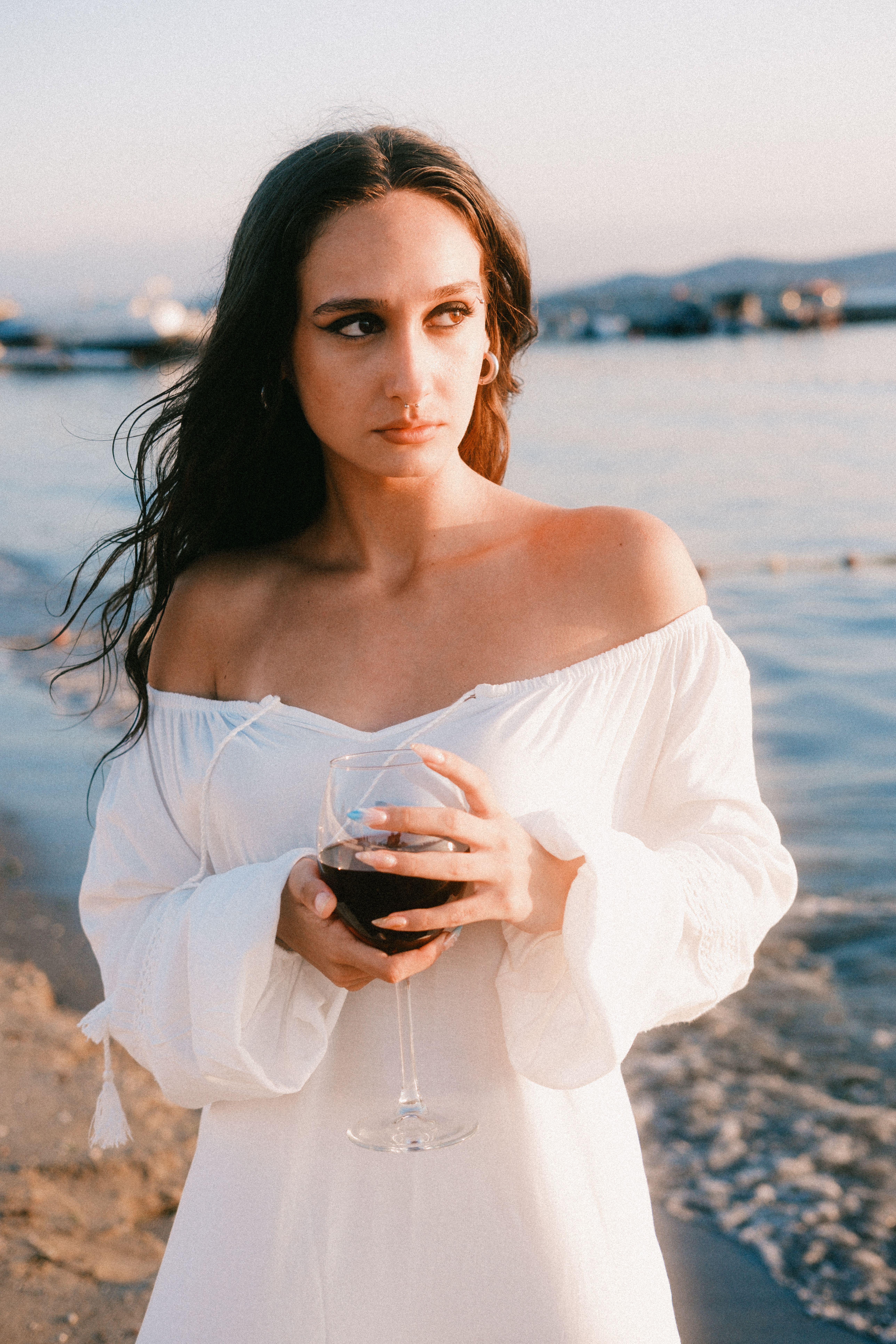 Elegant Woman in White Dress by the Seaside Free Stock Photo Elegant Woman in White Dress by the Seaside Free Stock Photo