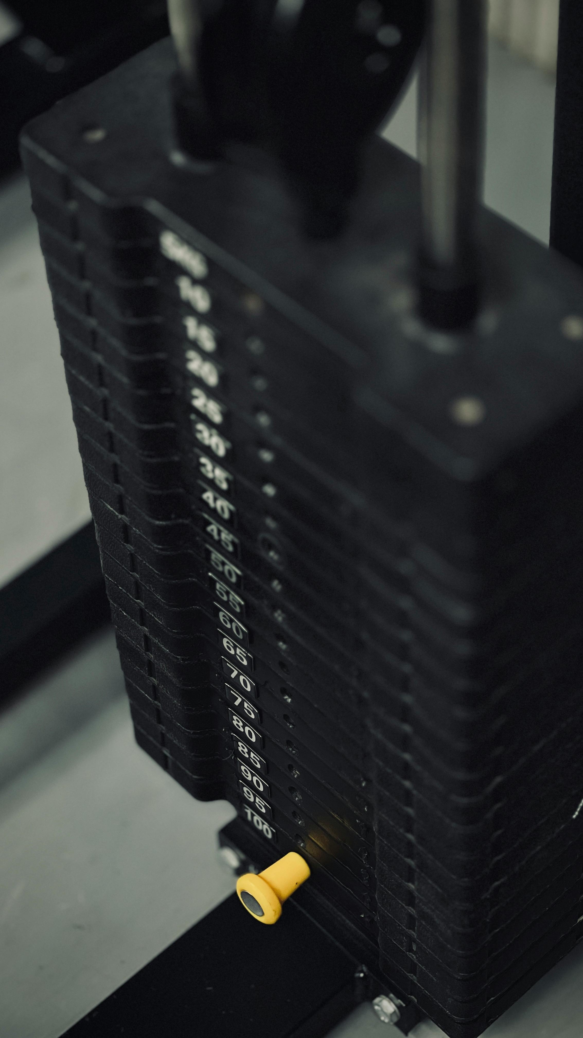 Close-Up of Gym Equipment Weight Stack · Free Stock Photo
