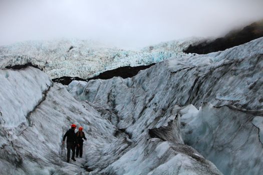 Discover the thrill of glacier hiking in Iceland's stunning icy landscapes.