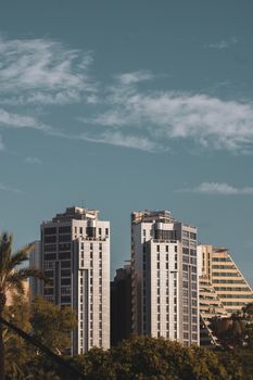 Captivating skyline of modern high-rise buildings in Valencia, Spain, under a clear blue sky.