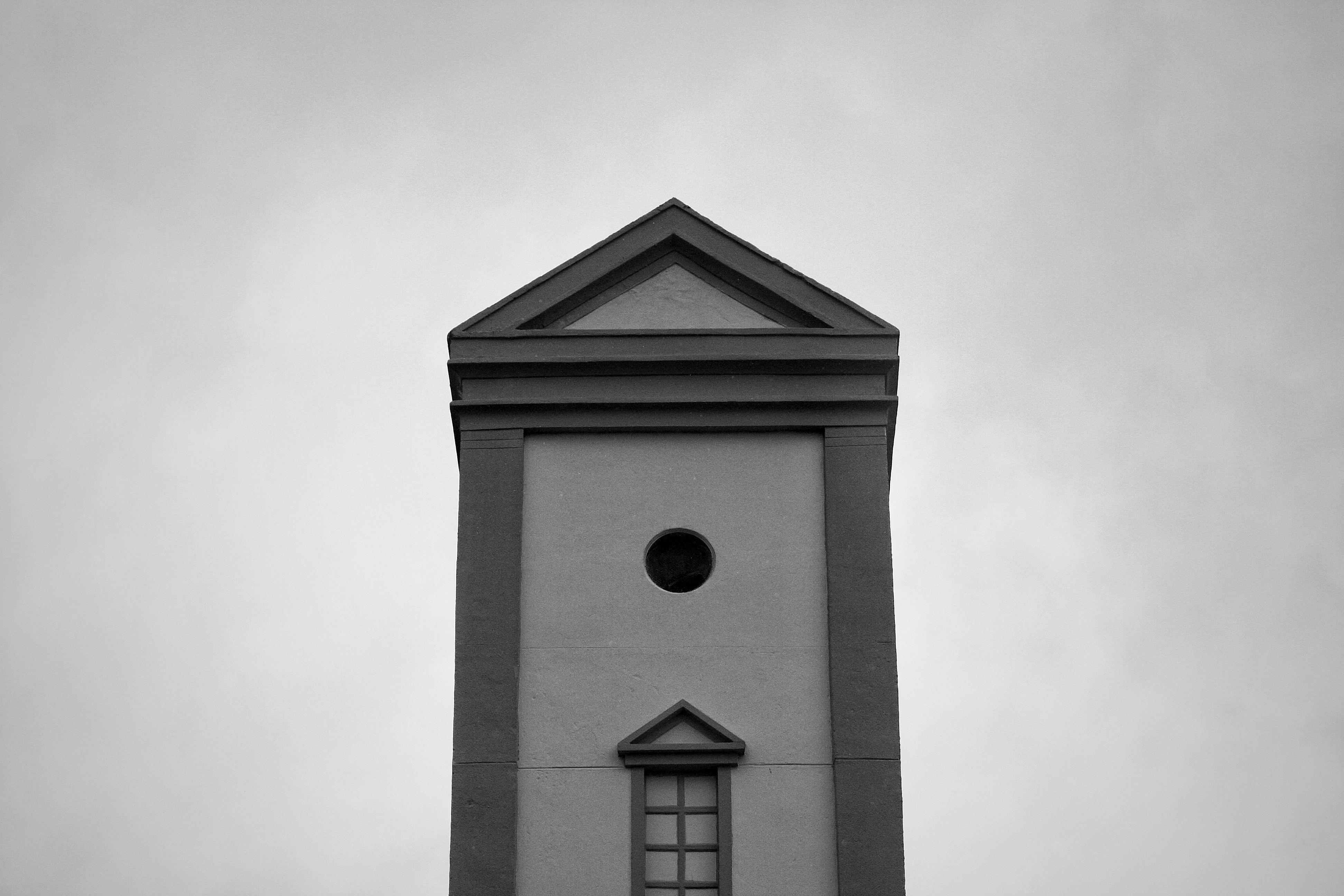 Historic Clock Tower Against Cloudy Sky · Free Stock Photo