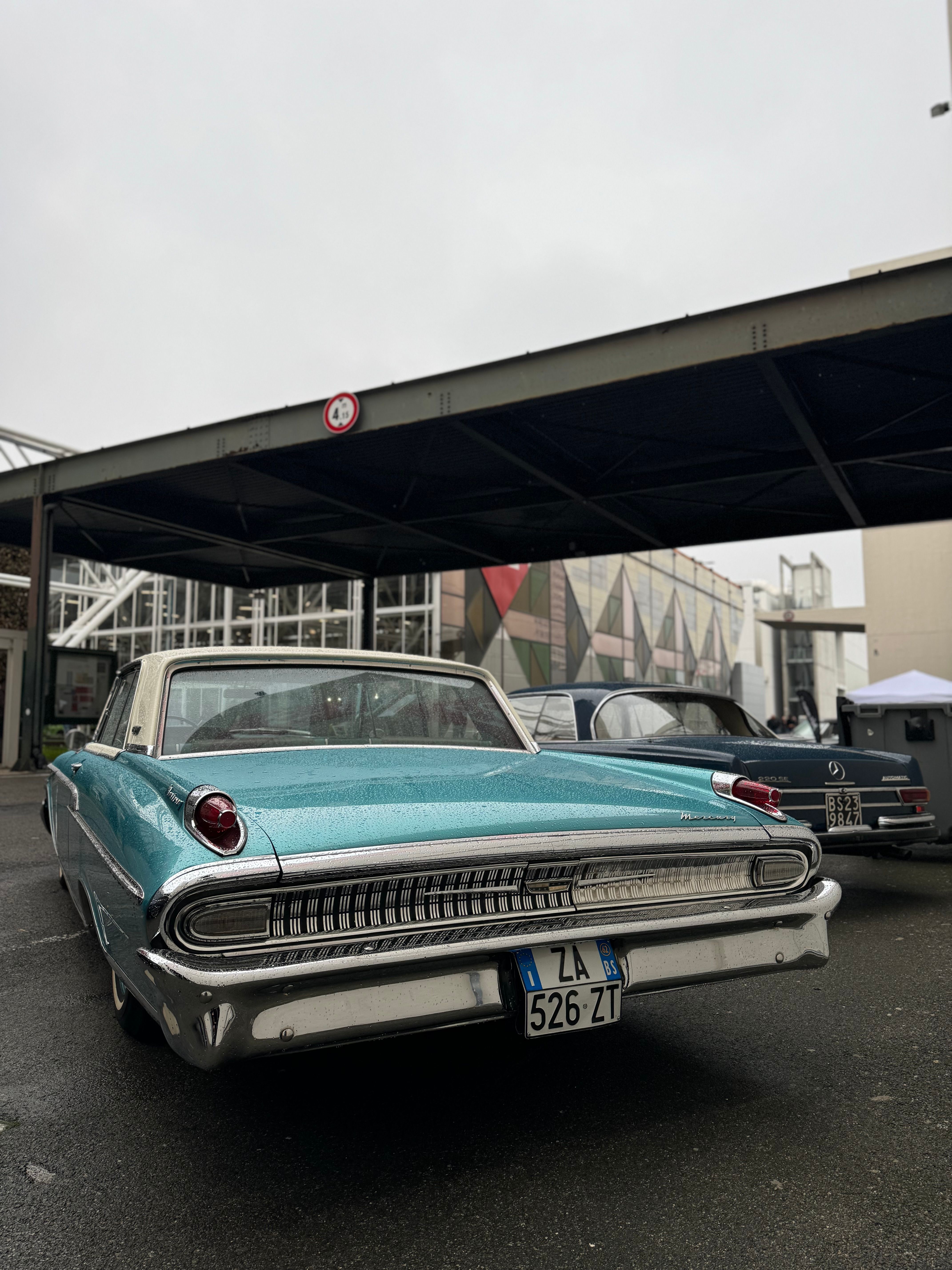 Vintage Car Under Urban Canopy · Free Stock Photo