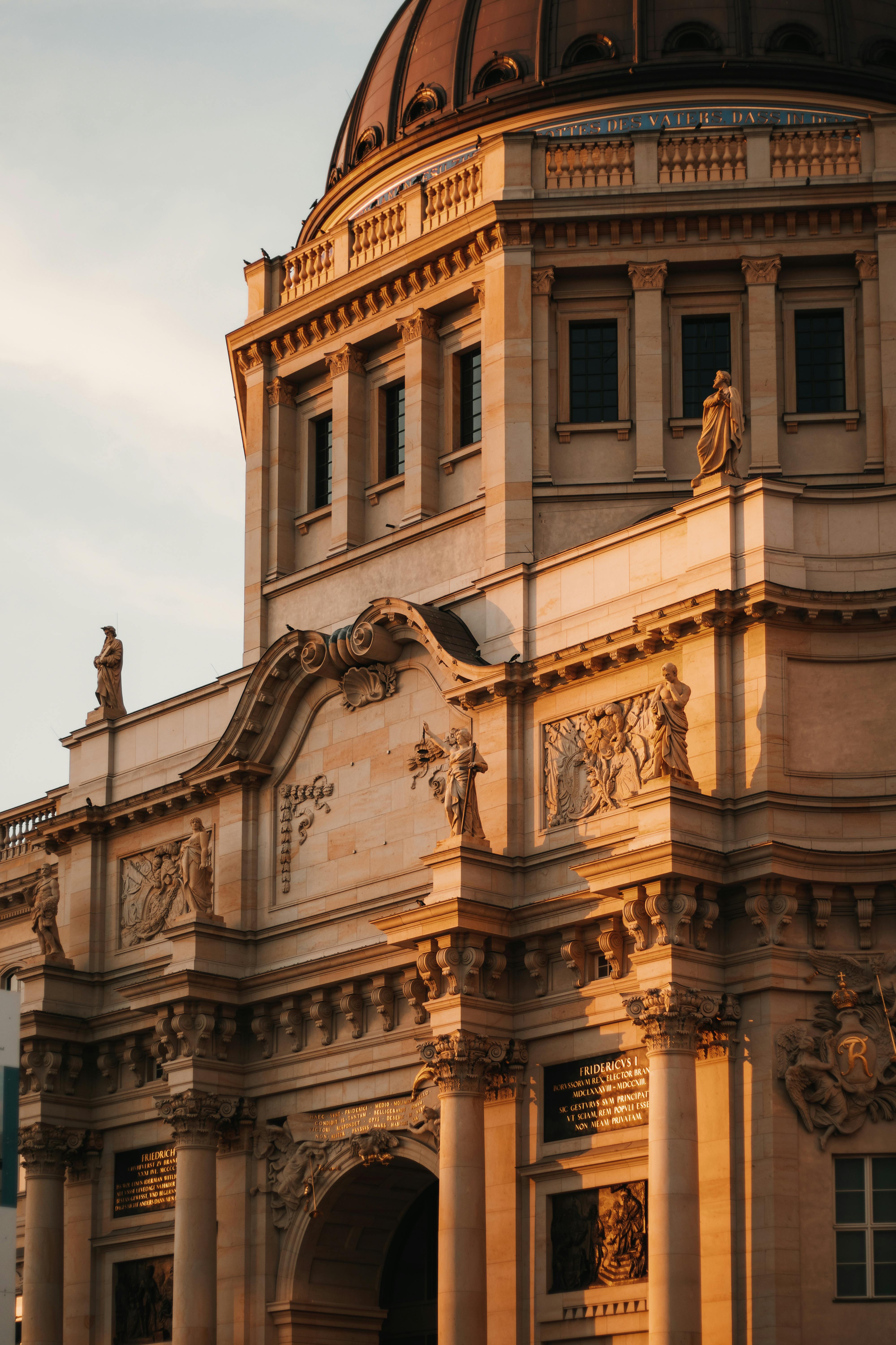 Warm evening light casts beautiful shadows on Berlin Cathedral's intricate architecture.