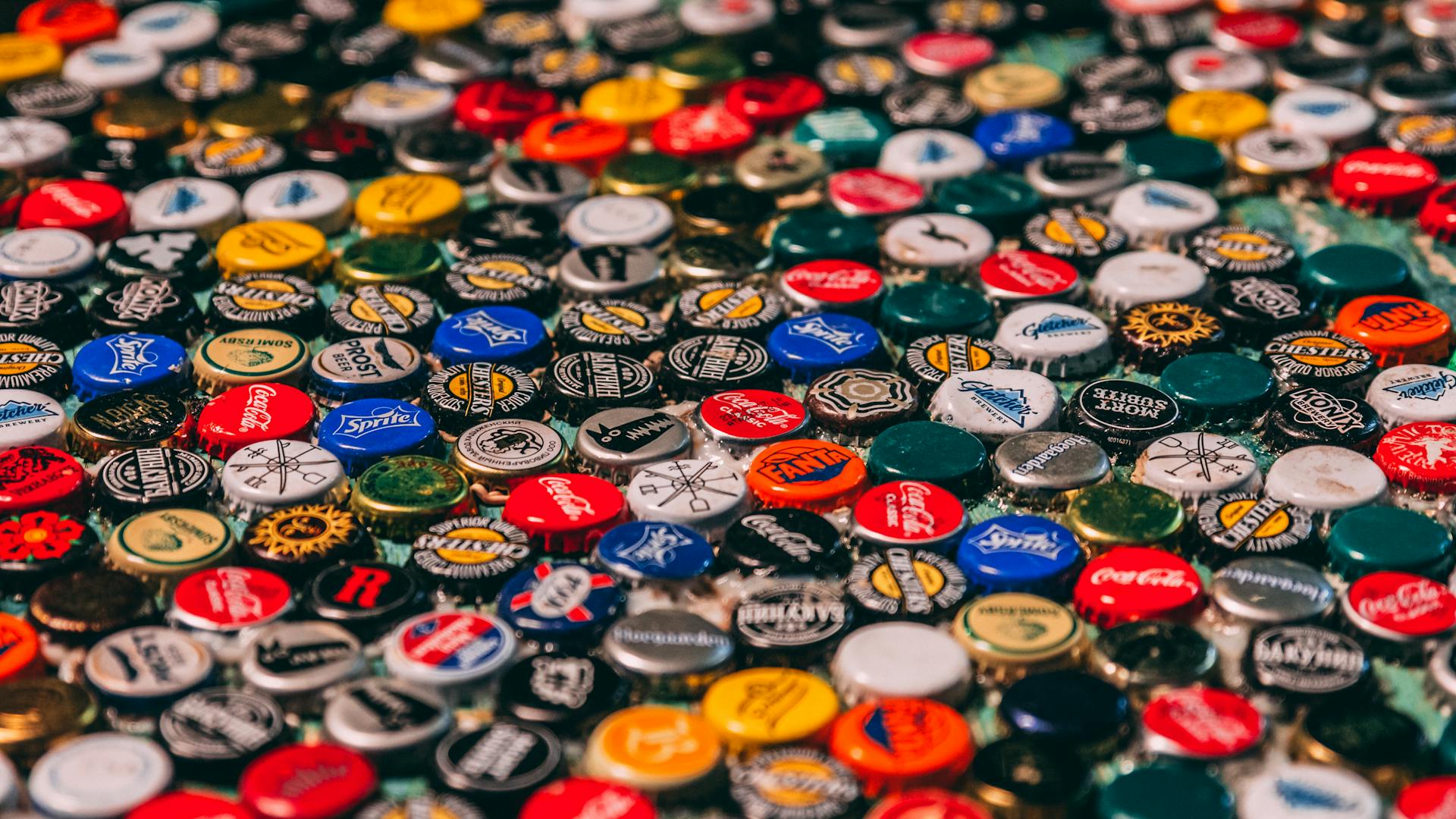 Collection of multicolored metal caps from bottles