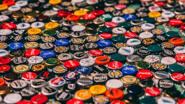 Collection Of Multicolored Metal Caps From Bottles