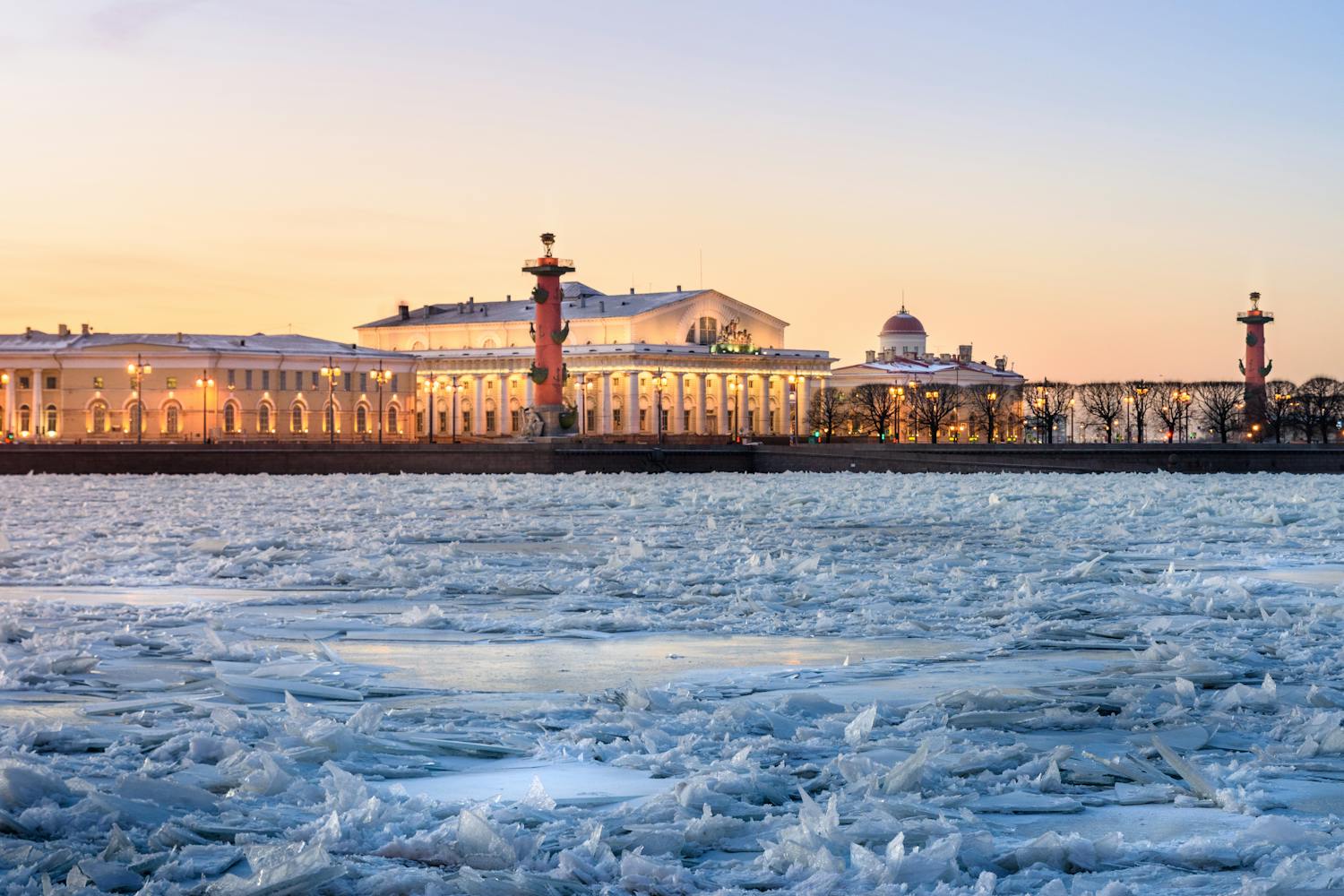 Beautiful winter view of an ice-covered river with iconic architecture