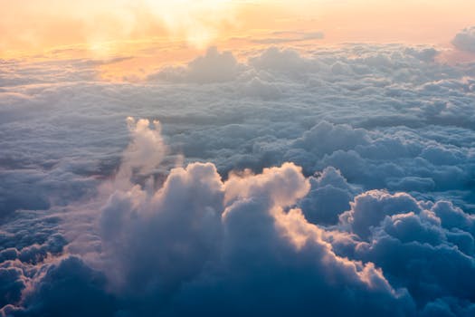 Scenic Photo Of Clouds During Daytime with the Quote "Normal is the average of deviance." written on it and have average color value #7E848C