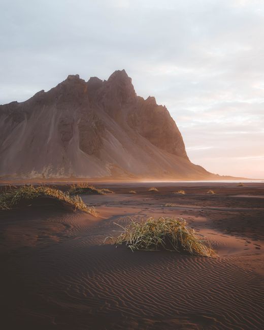 Breathtaking view of Vestrahorn mountain at sunrise in Iceland.