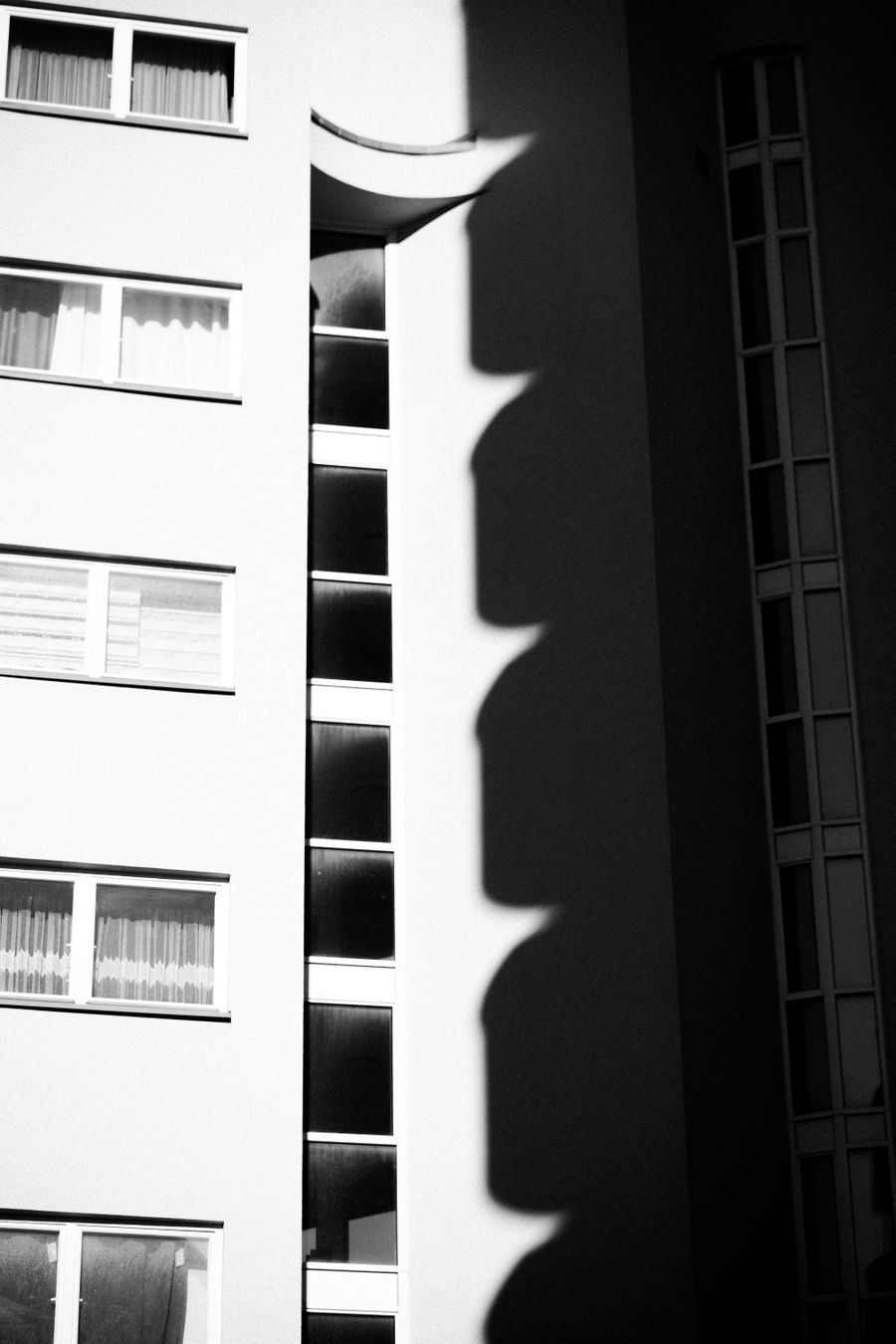Black and white modern architecture with daylight and shadow patterns