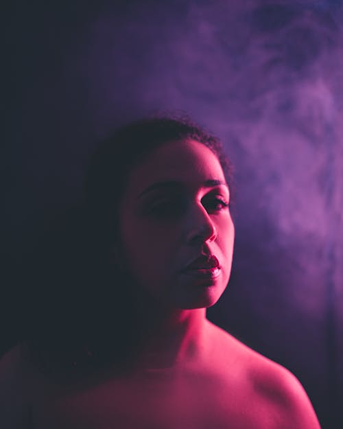 Free Close-Up Photo Of Woman In Dark Room Stock Photo