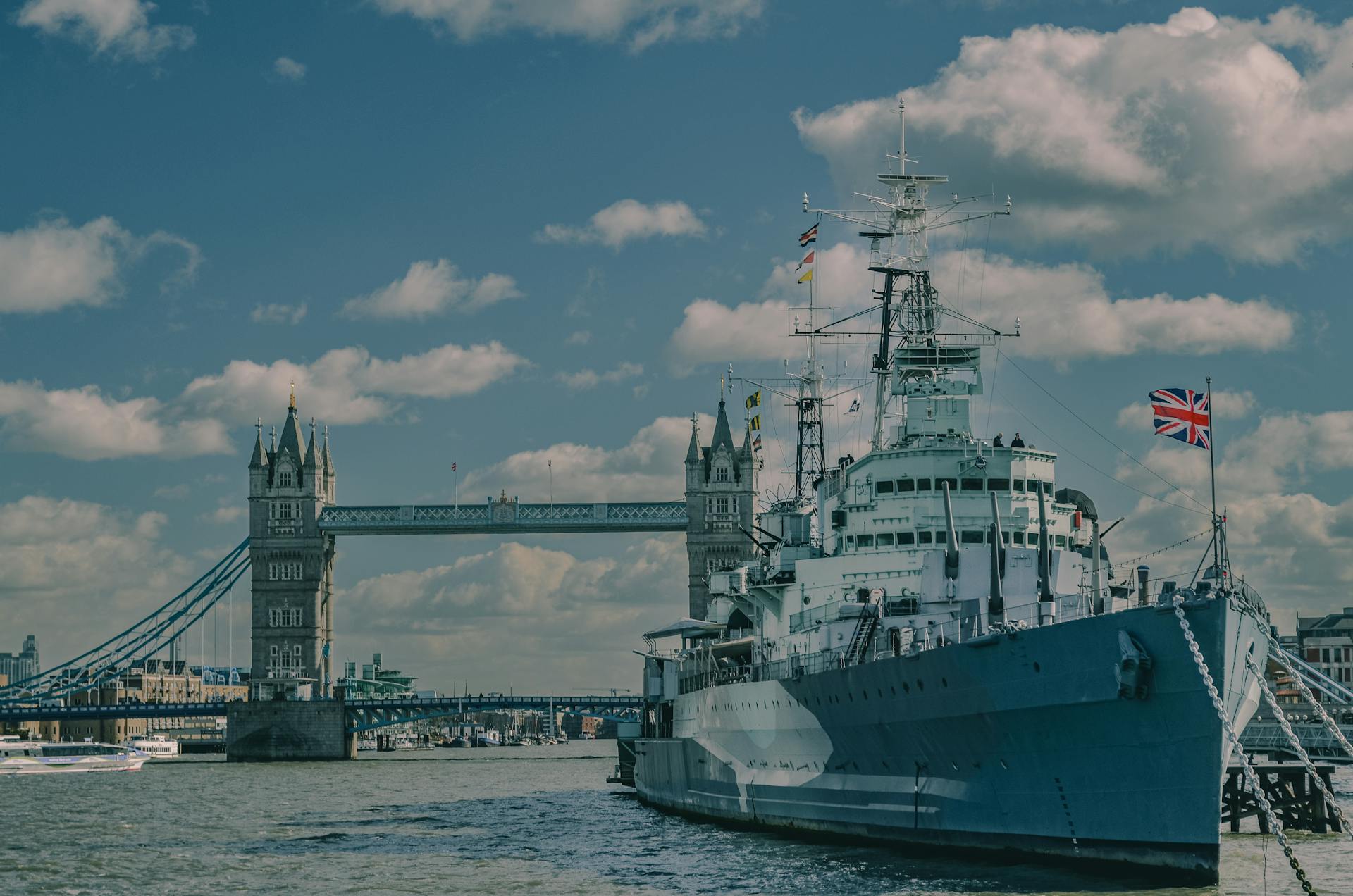 Historic Warship with Tower Bridge in London