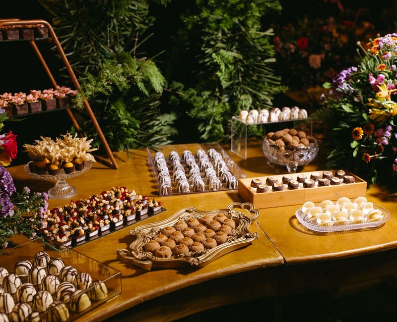 Selection of colorful sweets and desserts displayed on a table