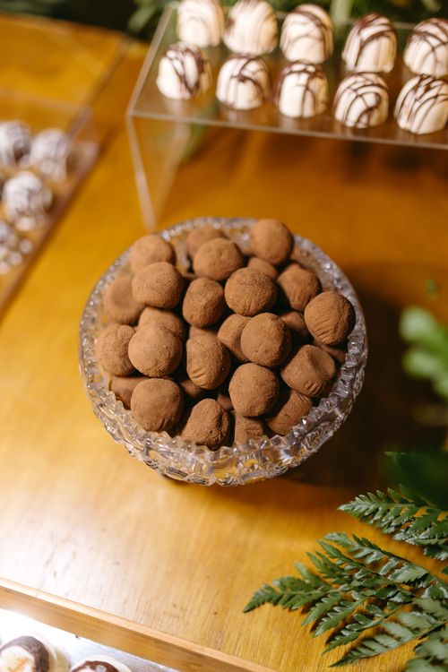 Free A beautiful display of chocolate truffles in a crystal bowl, perfect for indulgent desserts. Stock Photo