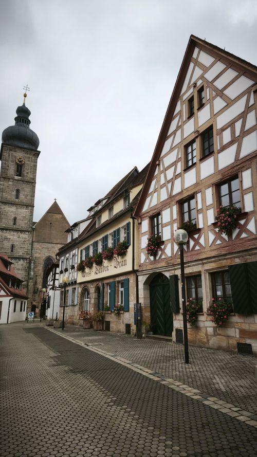 Free Quaint street with historic half-timbered houses in Forchheim, Bavaria, Germany. Stock Photo
