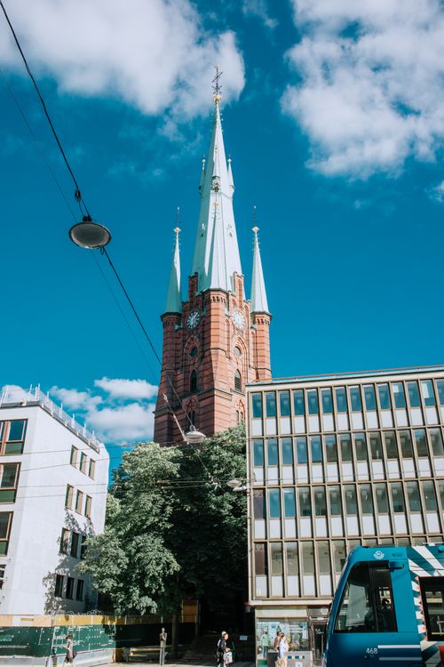 Free Stunning view of St. Jacob's Church in Stockholm with modern buildings and tram. Stock Photo