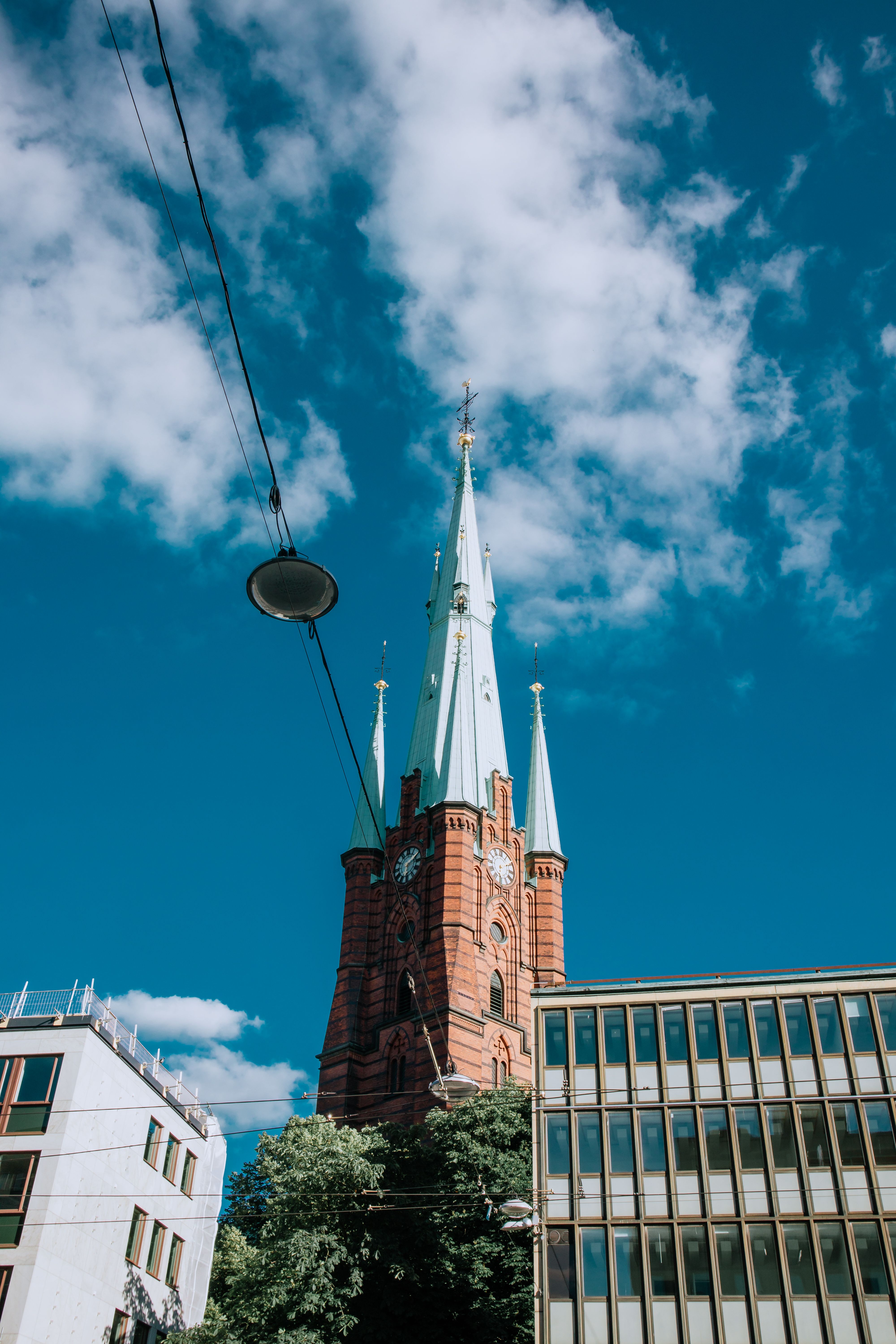Historic Clock Tower Against Blue Sky · Free Stock Photo