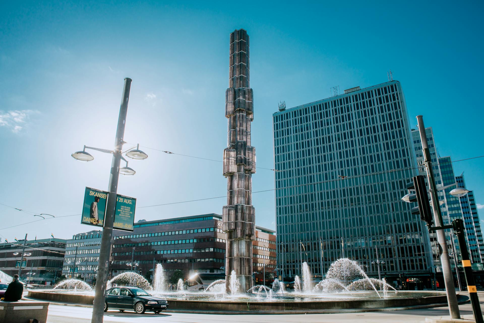 View of Sergels Torg in Stockholm featuring the iconic fountain and city architecture.