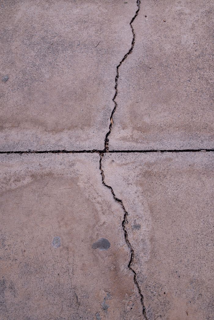 Example photo of a cracked concrete slab surface