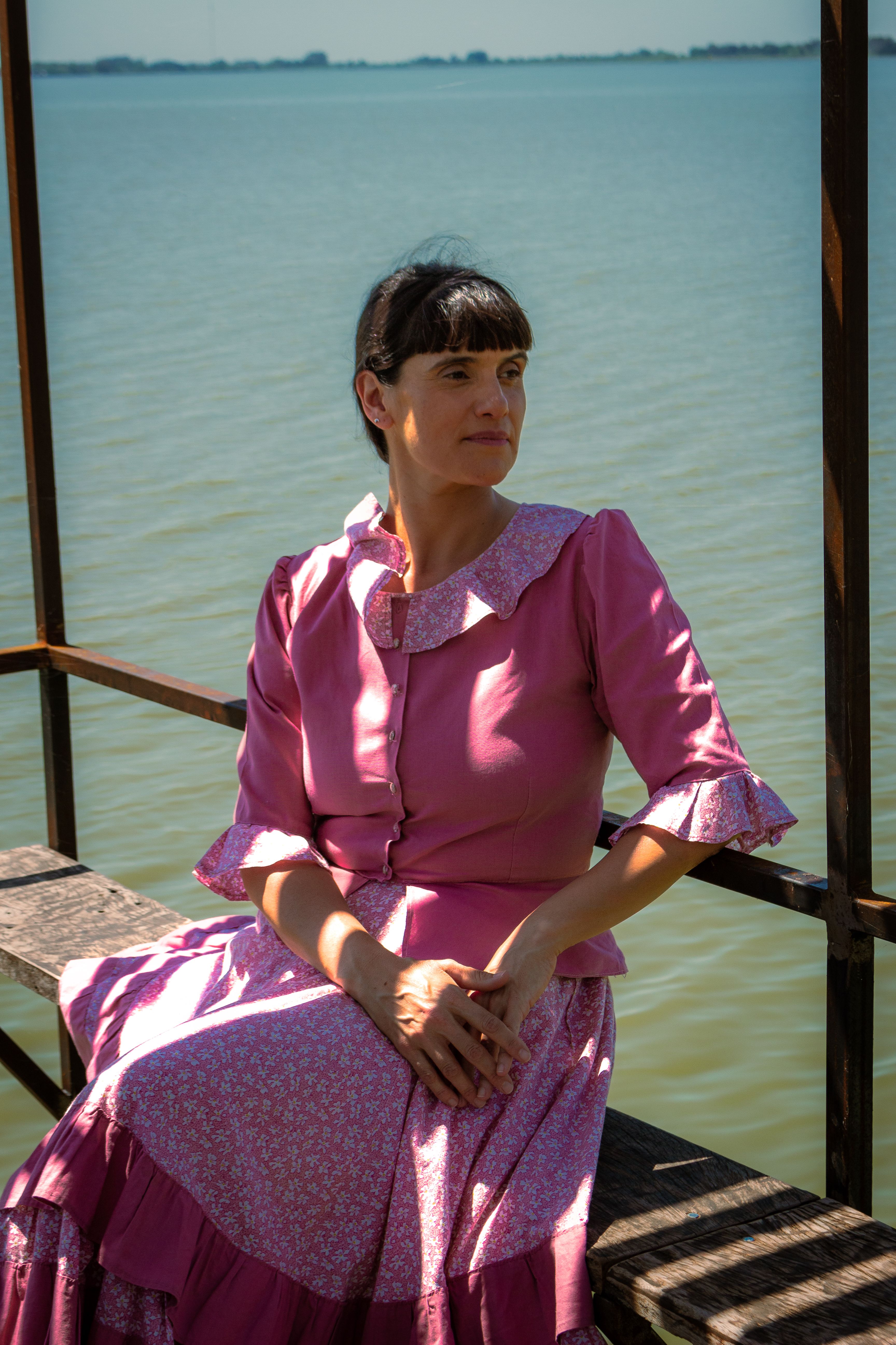 Woman in Pink Dress by Tranquil Lake · Free Stock Photo