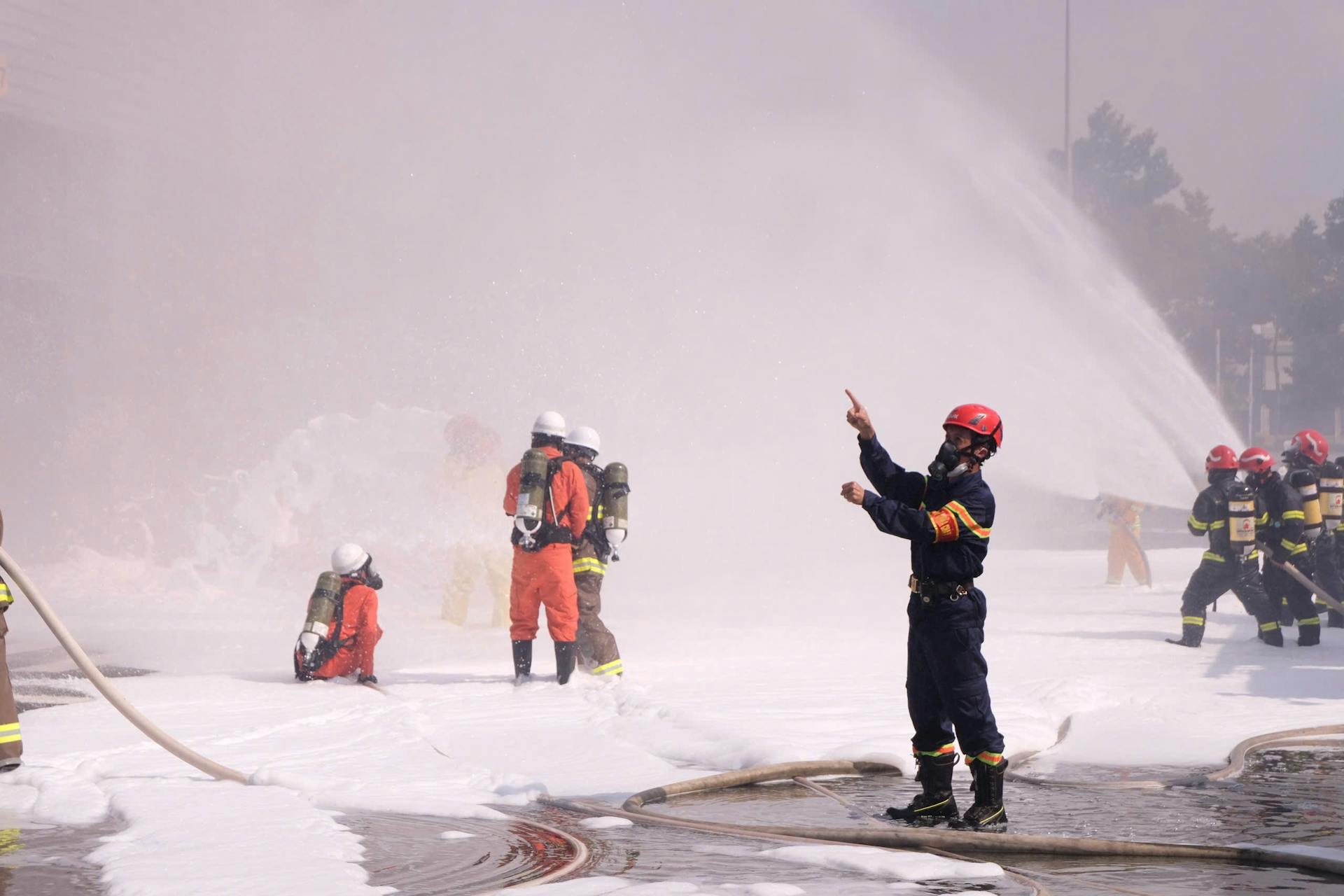 Firefighters Training with Foam in Action Scene