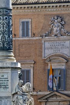 A detailed view of Roman architecture and statue, featuring historic inscriptions.
