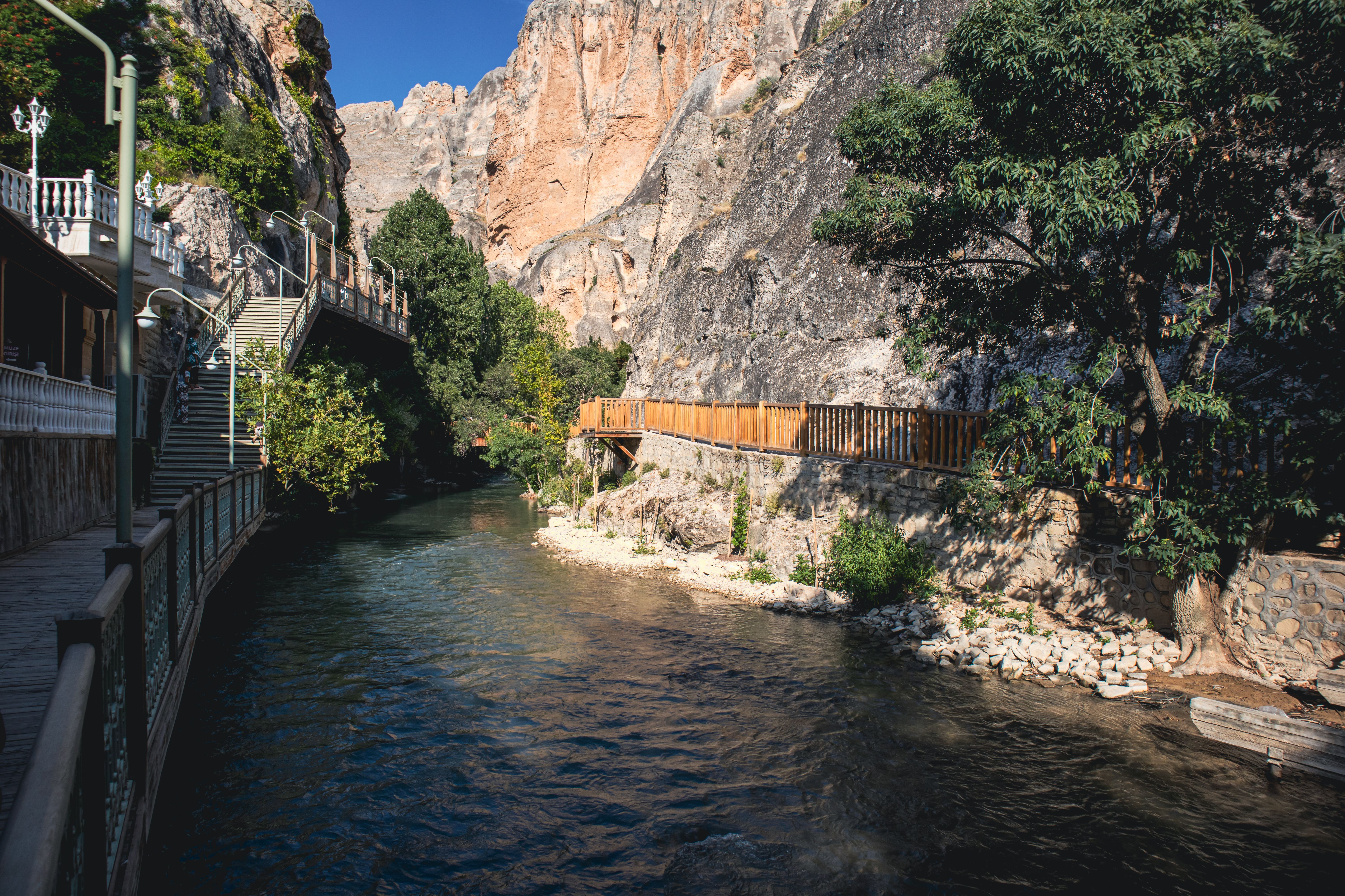 Beautiful river path surrounded by cliffs in Darende, Türkiye. Perfect for tranquil walks.