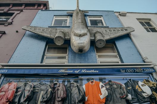 Camden's House of Leather features a quirky airplane design with stylish jackets on display.