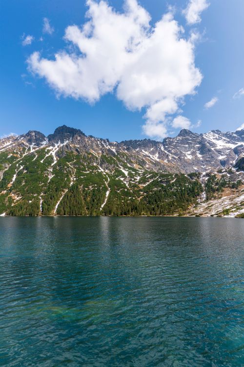 Free Explore the serene beauty of a mountain lake in the Tatra Mountains of Poland. Stock Photo