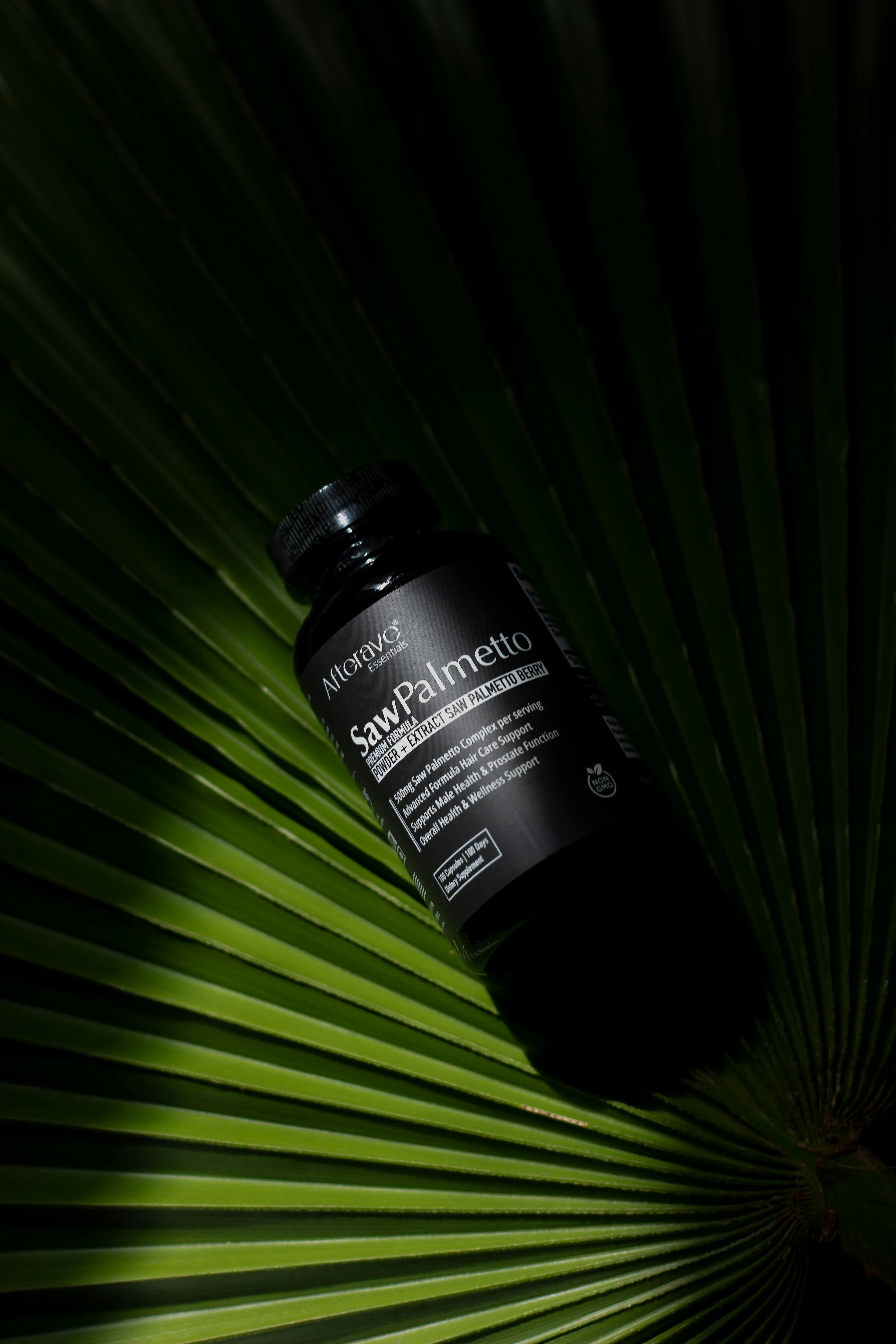 Saw Palmetto Supplement on Palm Leaf · Free Stock Photo