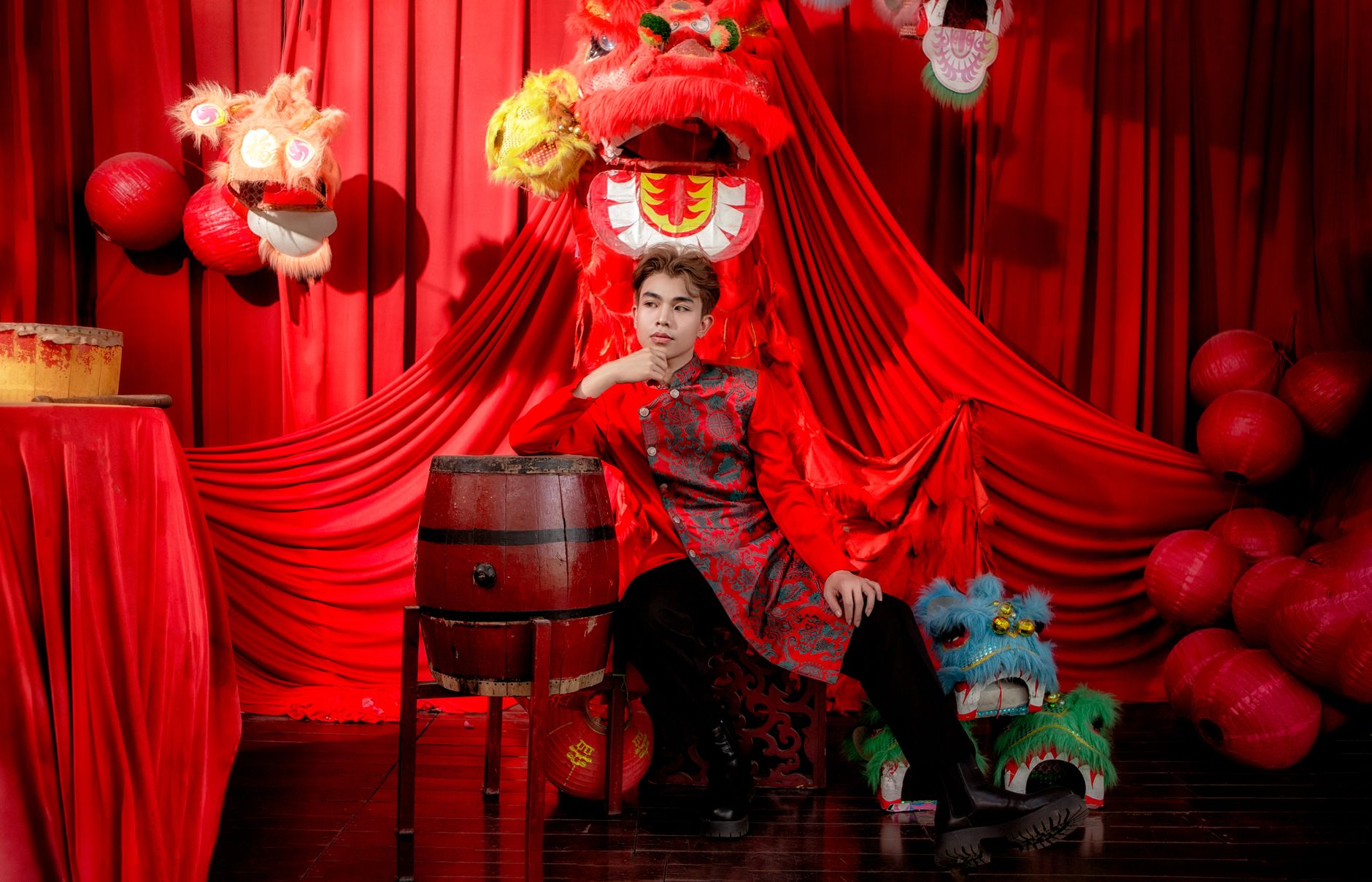 A traditional Vietnamese wedding scene with vibrant red lion dance decorations.