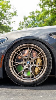 Detailed shot of a high-performance car wheel with visible brake disc in Illinois, USA.