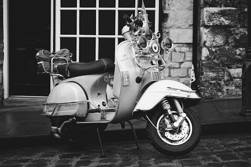 Grayscale Photography Of Motor Scooter