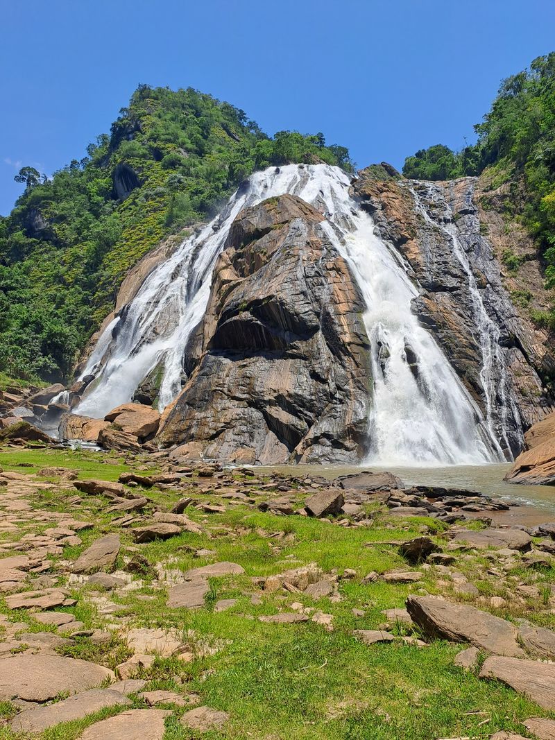 Magnificent Dudhsagar waterfall in summer landscape