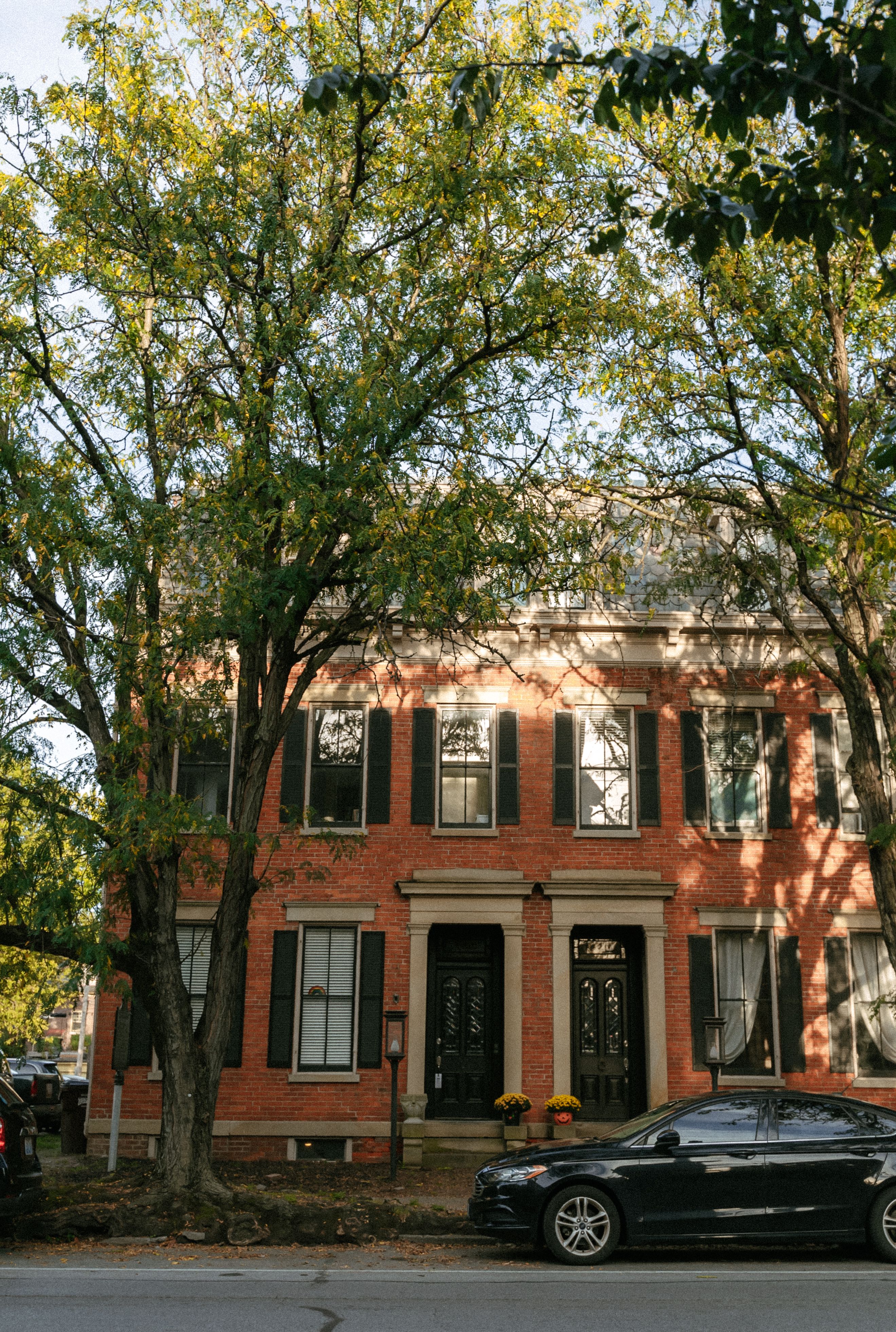 Darkened photo of a historic brick Brandywine Valley home
