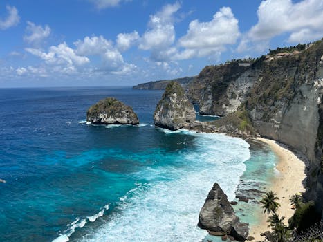 Aerial view of breathtaking beach and cliffs at Nusa Penida, Bali, Indonesia.