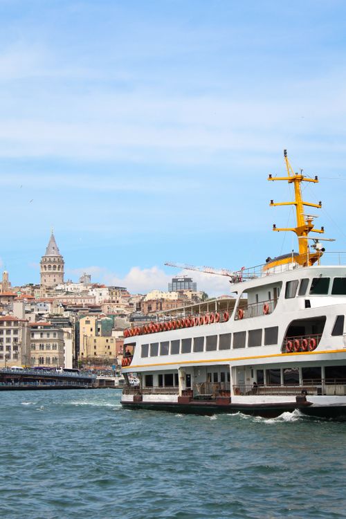 Galata Tower and Ferry in Istanbul's Karaköy District · Free Stock Photo