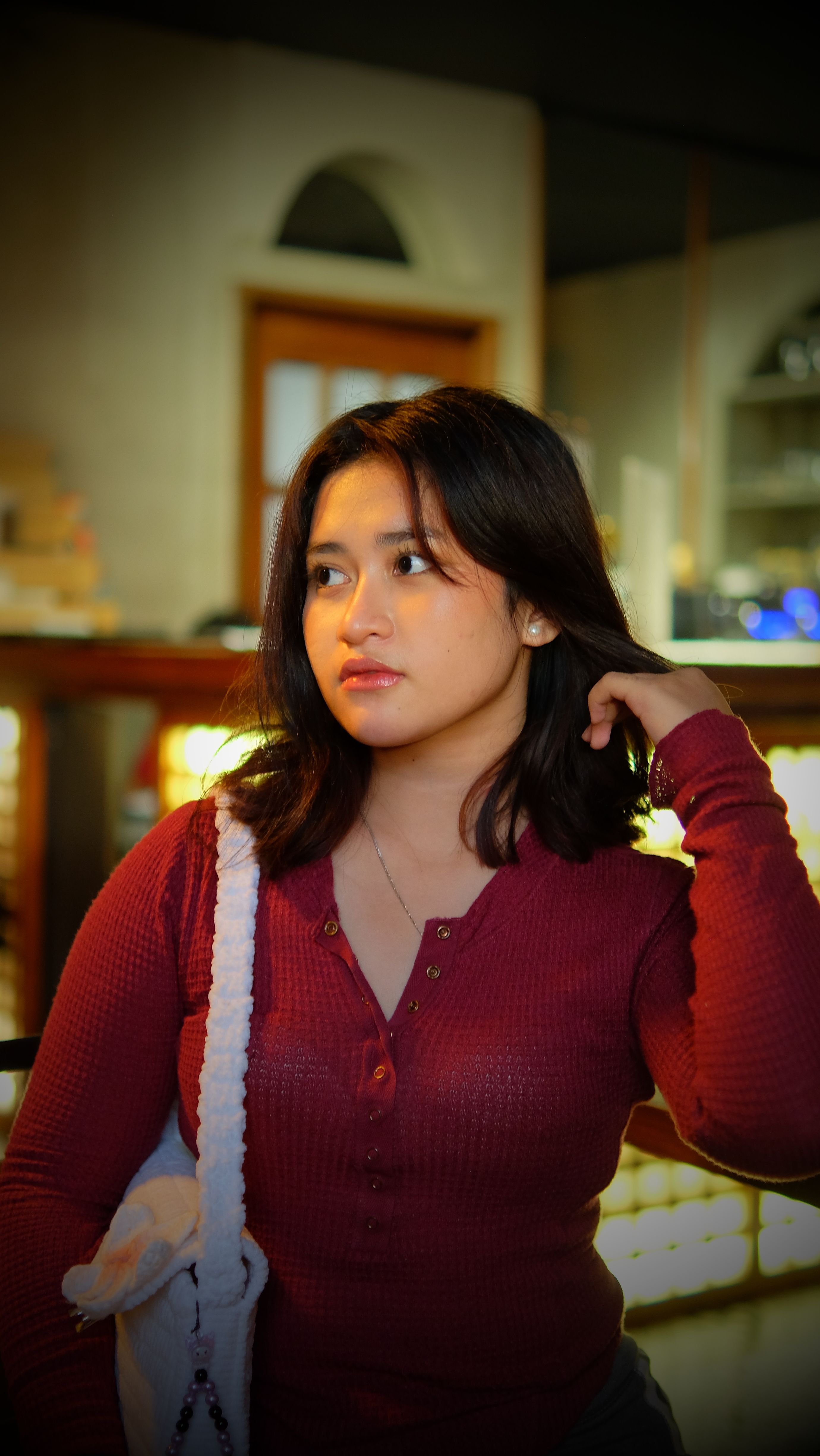 portrait of a young woman in chic urban setting