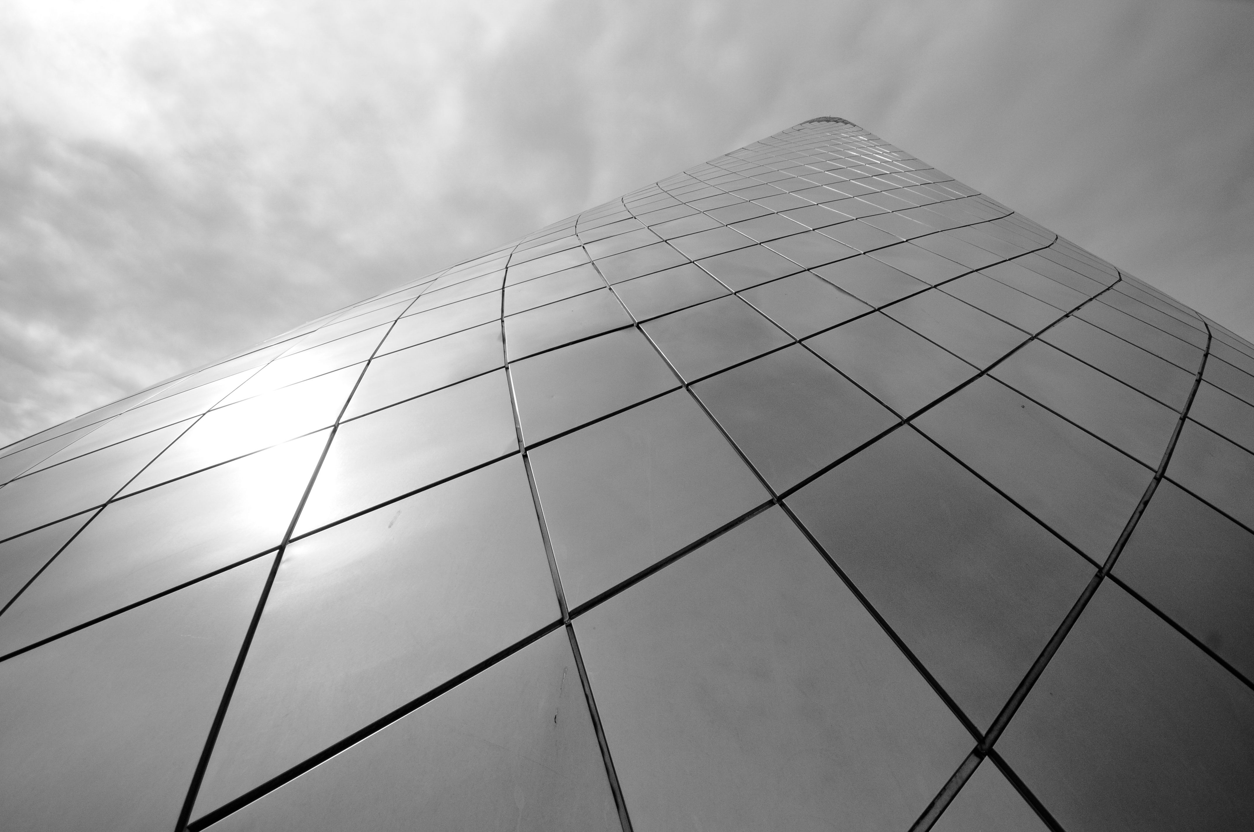 Modern Architecture with Reflective Surfaces · Free Stock Photo