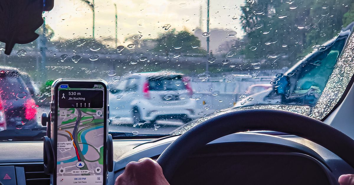 Car Distance Rain Driving in Rainy Weather with GPS Navigation · Free Stock Photo