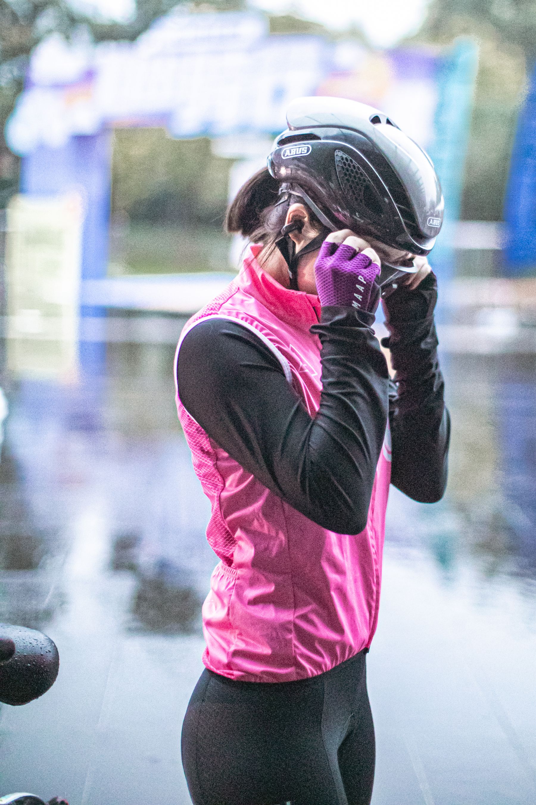 Cyclist preparing equipment before an outdoor ride