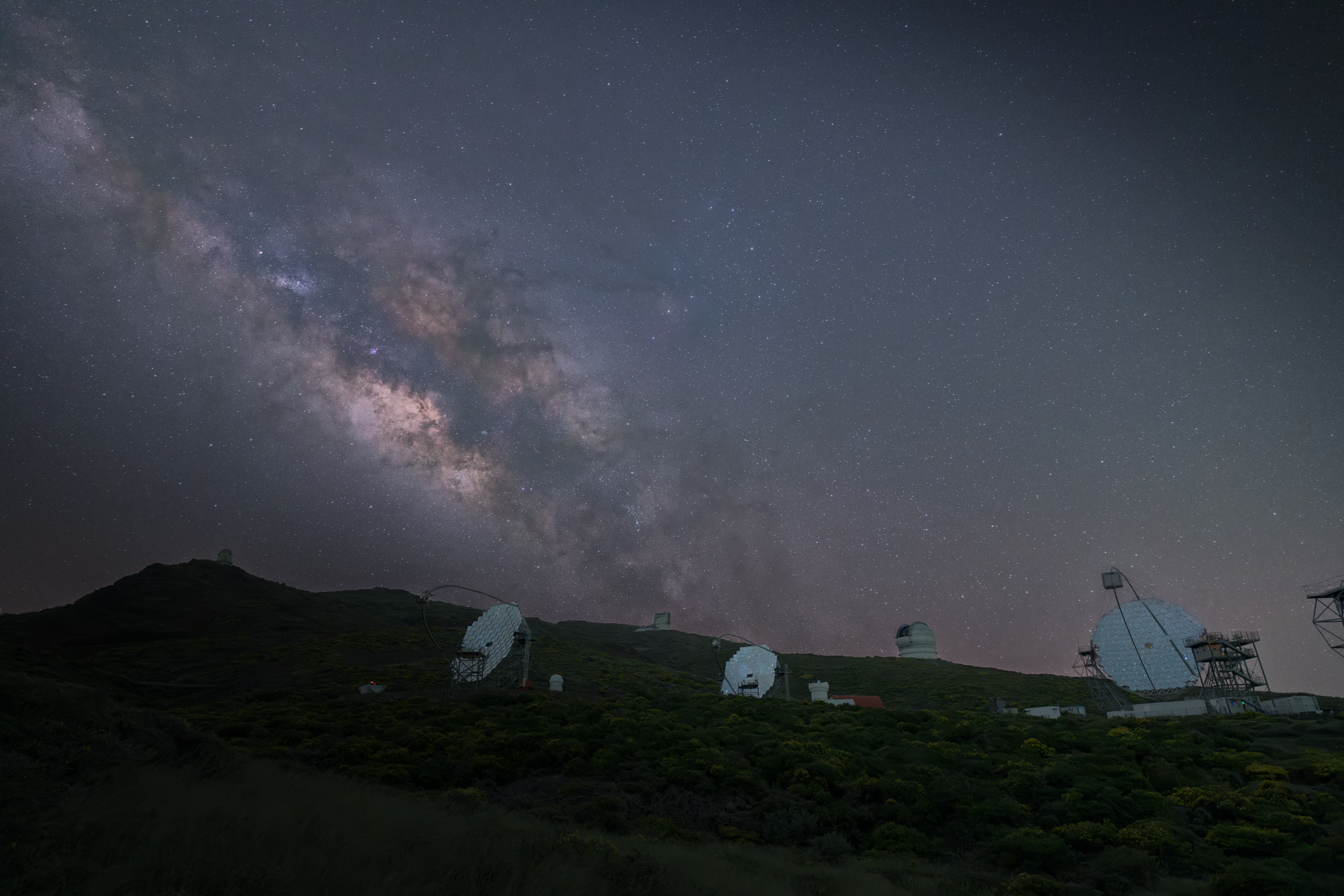 Stunning night sky with the Milky Way and telescopes in La Palma, Spain.