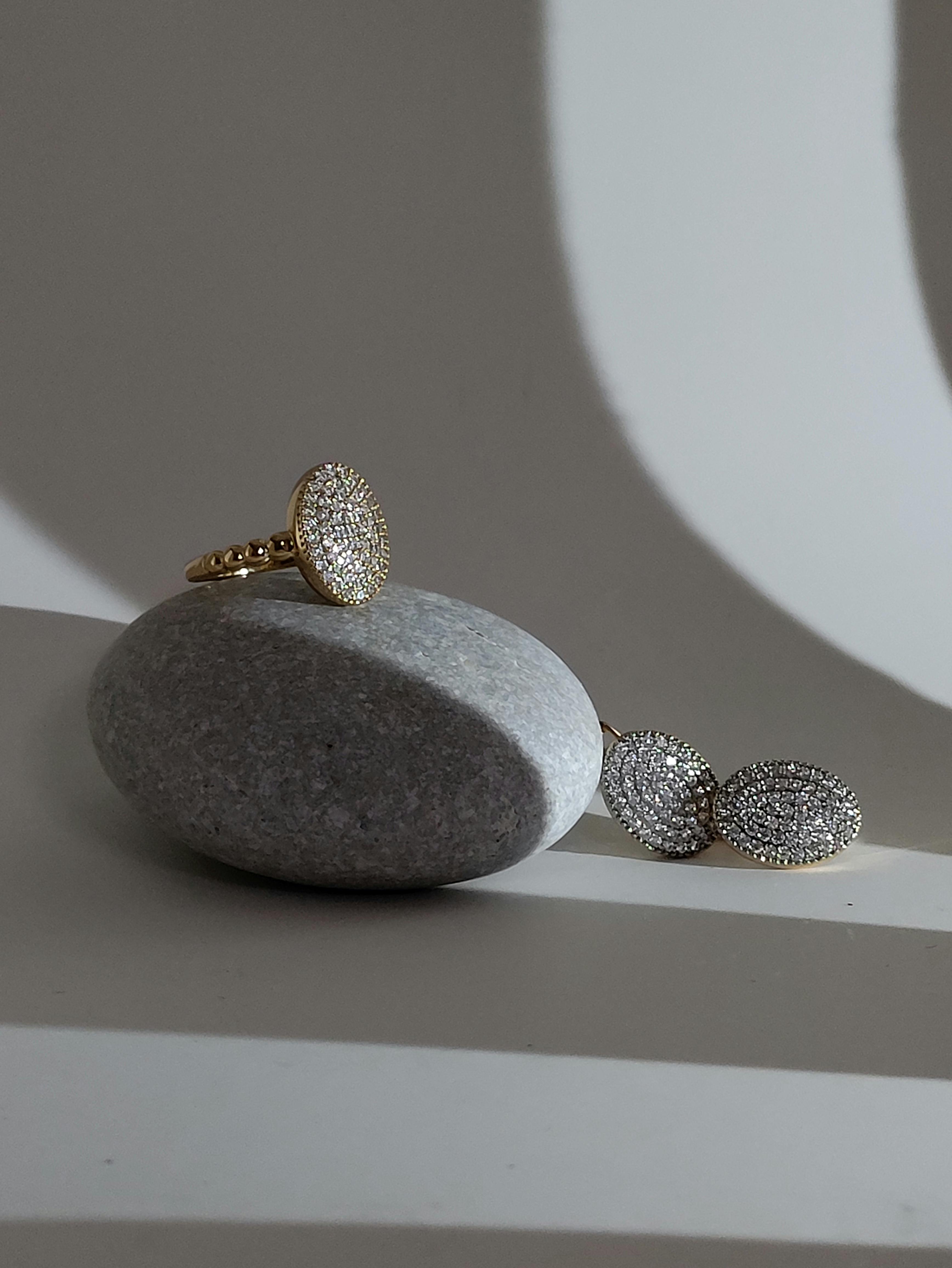 elegant jewelry display on gray stone