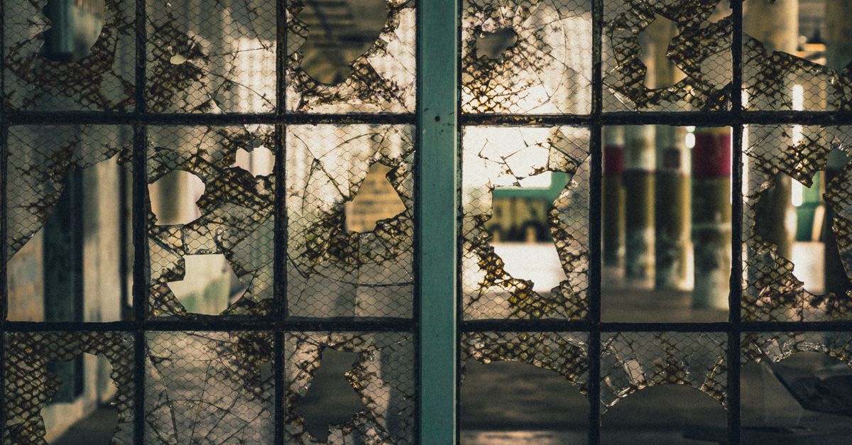 Broken Glass Window With Gray Metal Frame · Free Stock Photo