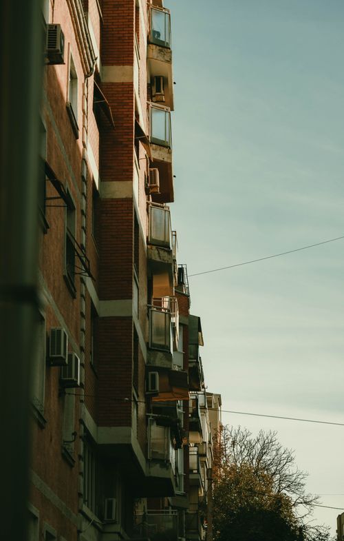 Free Street-level view of a typical red-brick residential building in Belgrade, Serbia. Stock Photo