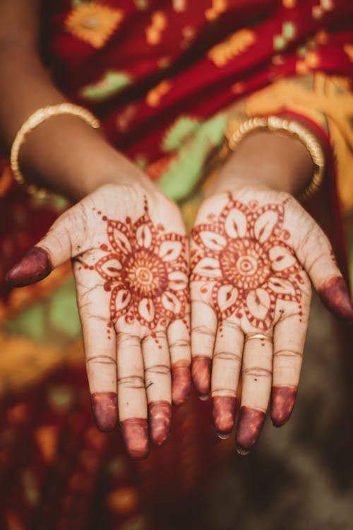 Free Woman Showing Henna Tattoo on Her Hands Stock Photo